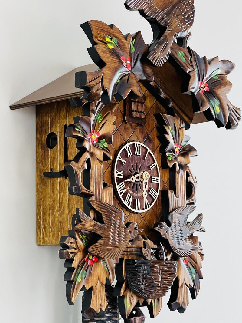 Eight Day Cuckoo Clock with Hand-painted Flowers, Leaves, and Animated Birds Feeding Baby Birds