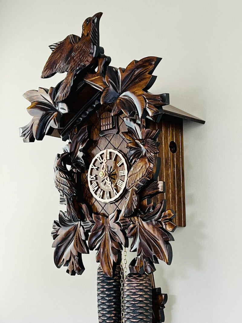 Eight Day Cuckoo Clock with Three Hand-carved Birds and Seven Leaves