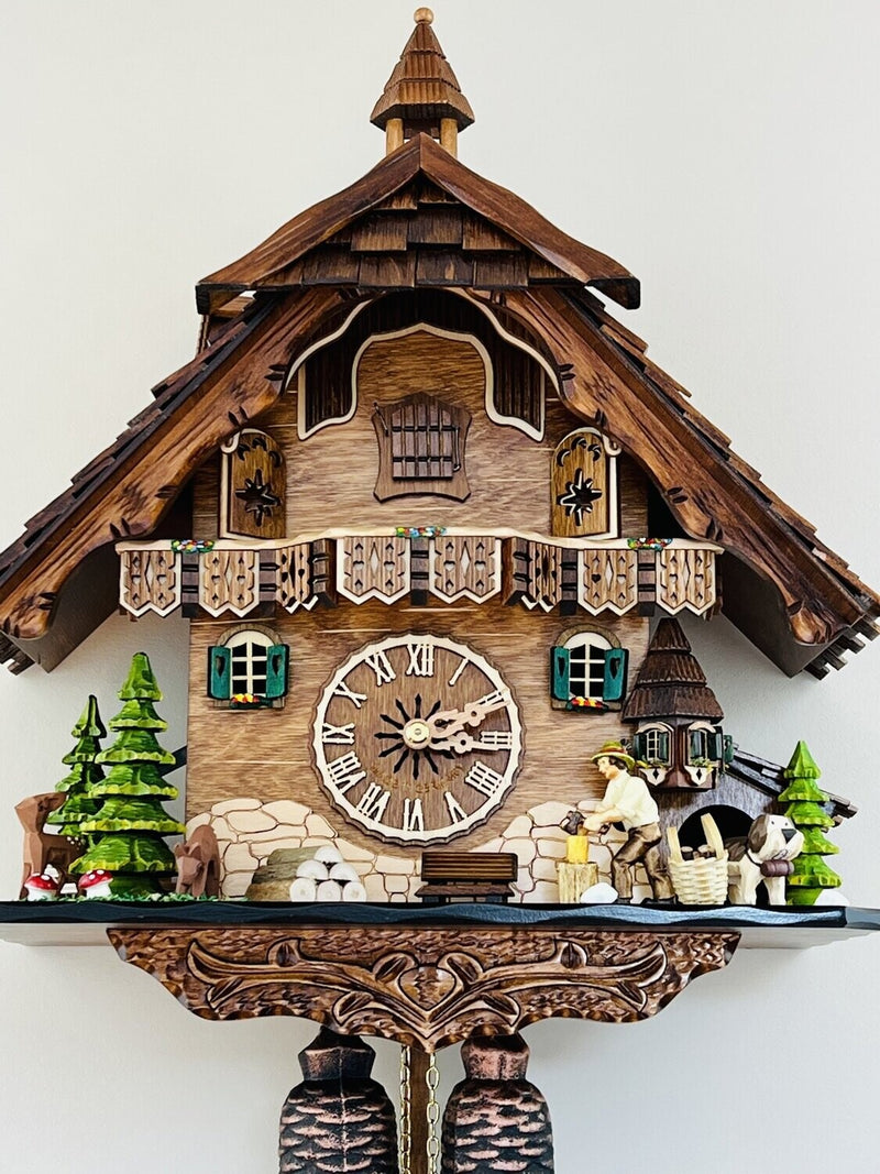 Eight Day Cuckoo Clock  - Cottage, Turret, Man Chopping Wood
