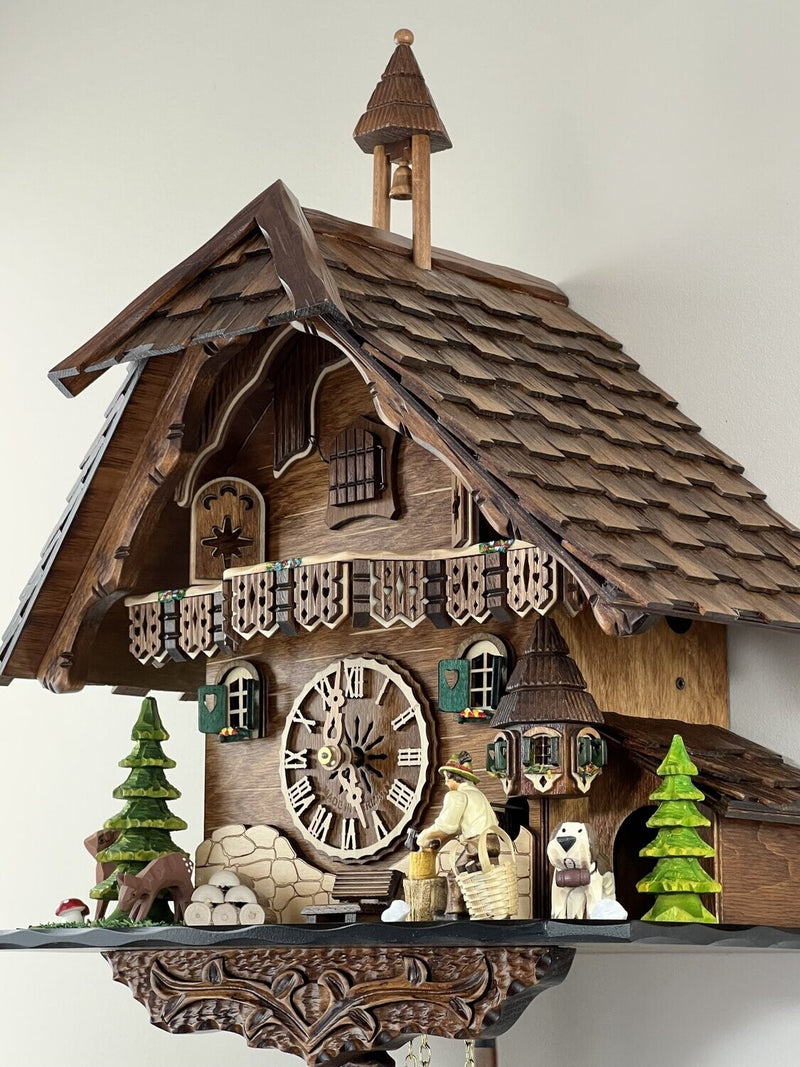 Eight Day Cuckoo Clock  - Cottage, Turret, Man Chopping Wood