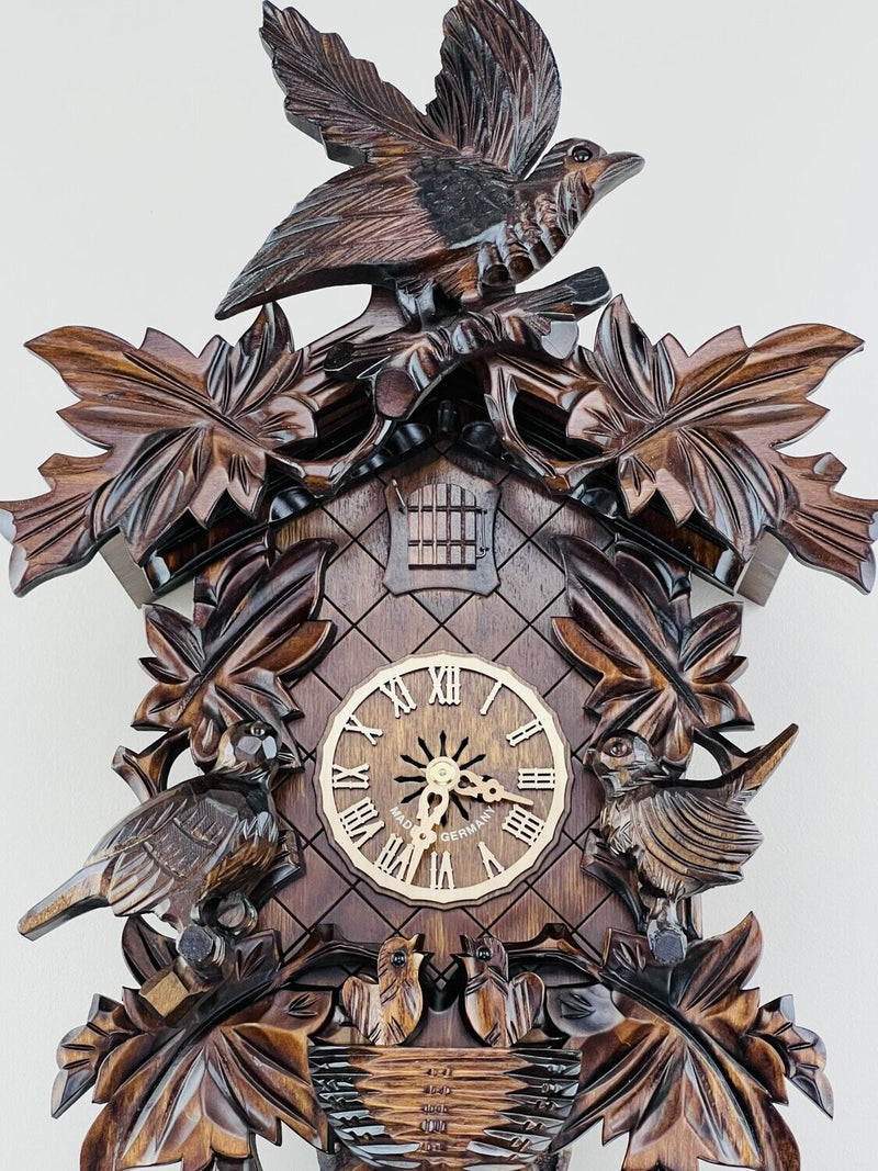 Eight Day Cuckoo Clock with Hand-carved Leaves, Birds, and Bird Nest with Chicks