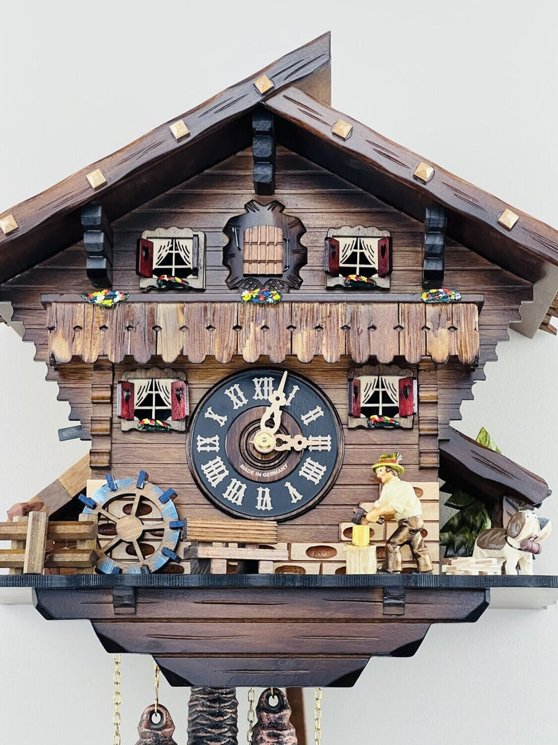 One Day Musical Cuckoo Clock Cottage with Man Chopping Wood and Waterwheel