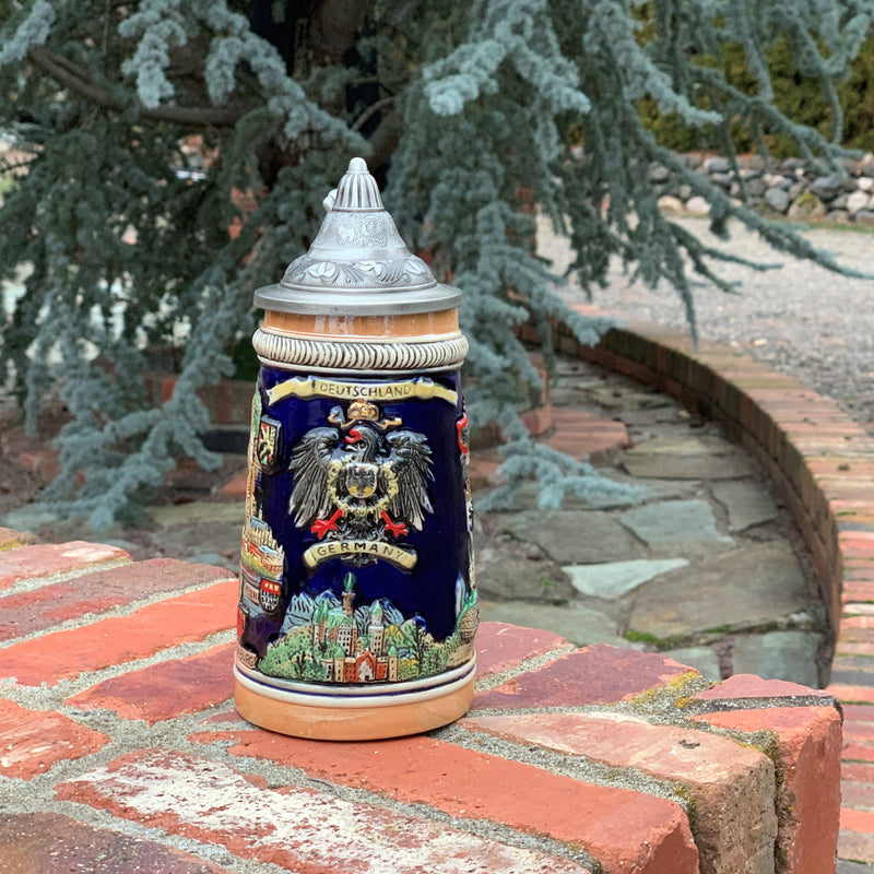 German Landmarks. This decorative engraved German Landmarks with a lid will make for a great gift or decorative accent to your collection! Colorfully decorated collectible beer steins are popular around the world. The origin of German Beer Steins date back to the 14th century.
