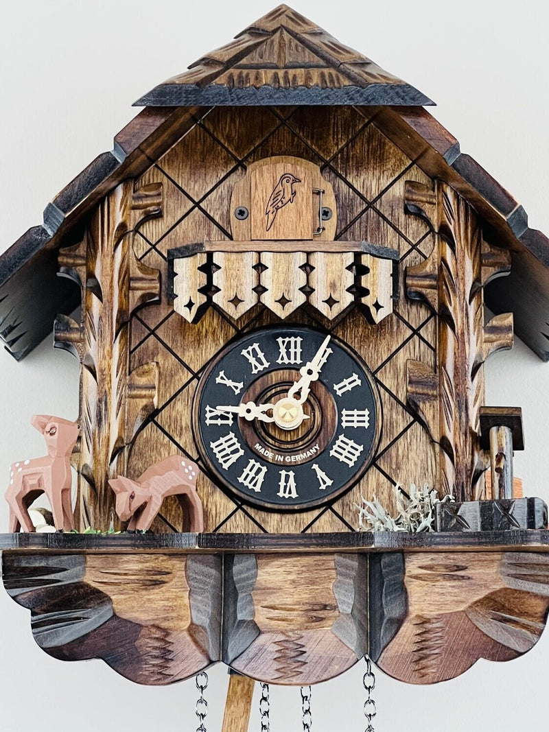 Musical Cuckoo Clock with Hand-carved Case and Feeding Deer