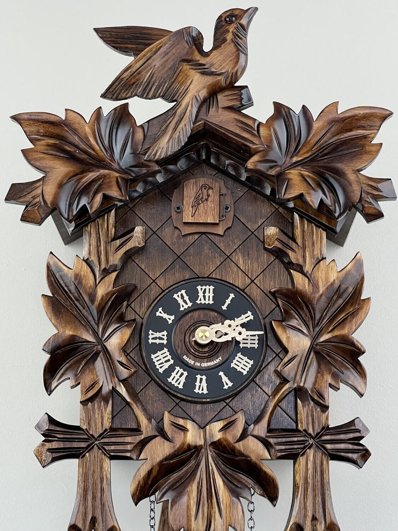 Traditional German Cuckoo Clock with Five Hand-carved Maple Leaves and One Bird