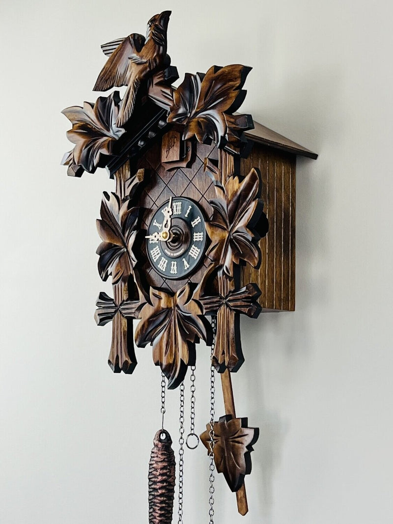 Traditional German Cuckoo Clock with Five Hand-carved Maple Leaves and One Bird