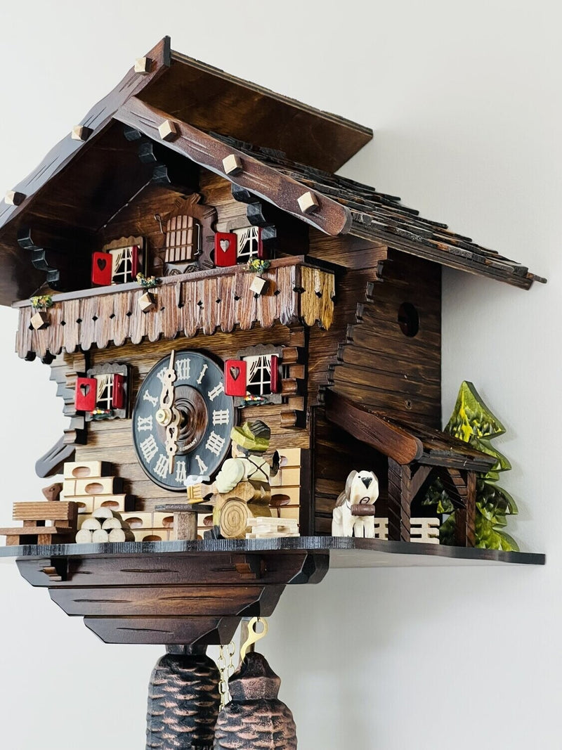 Eight Day Chalet Cuckoo Clock with Carved Deer, Dog, and Beer Drinker Drinking Beer - 12 Inches Tall