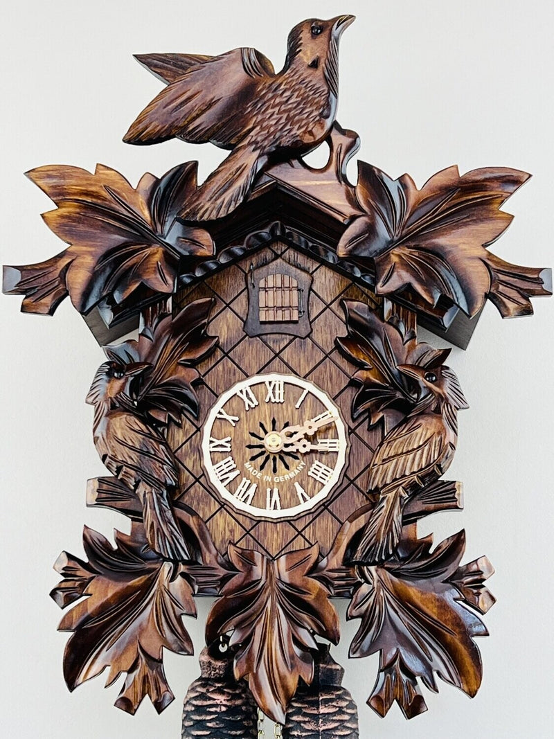 Eight Day Cuckoo Clock with Three Hand-carved Birds and Seven Leaves