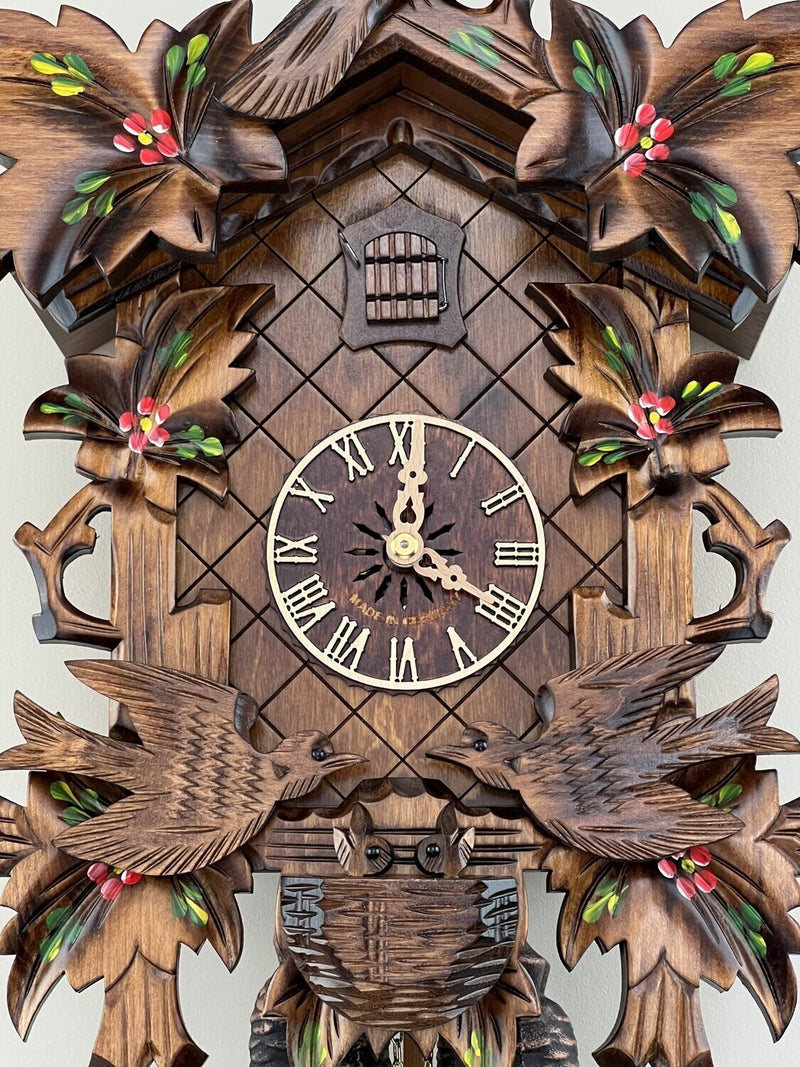 Eight Day Cuckoo Clock with Hand-painted Flowers, Leaves, and Animated Birds Feeding Baby Birds
