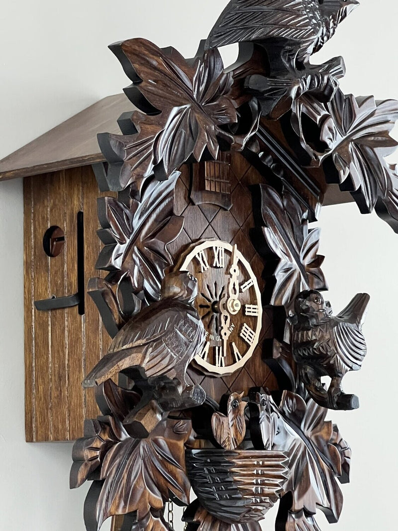 Eight Day Cuckoo Clock with Hand-carved Leaves, Birds, and Bird Nest with Chicks