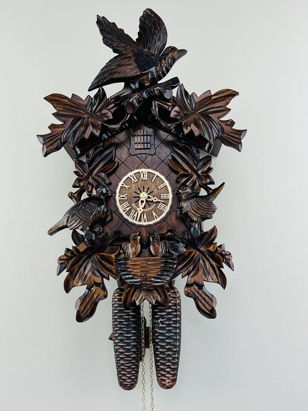 Eight Day Cuckoo Clock with Hand-carved Leaves, Birds, and Bird Nest w