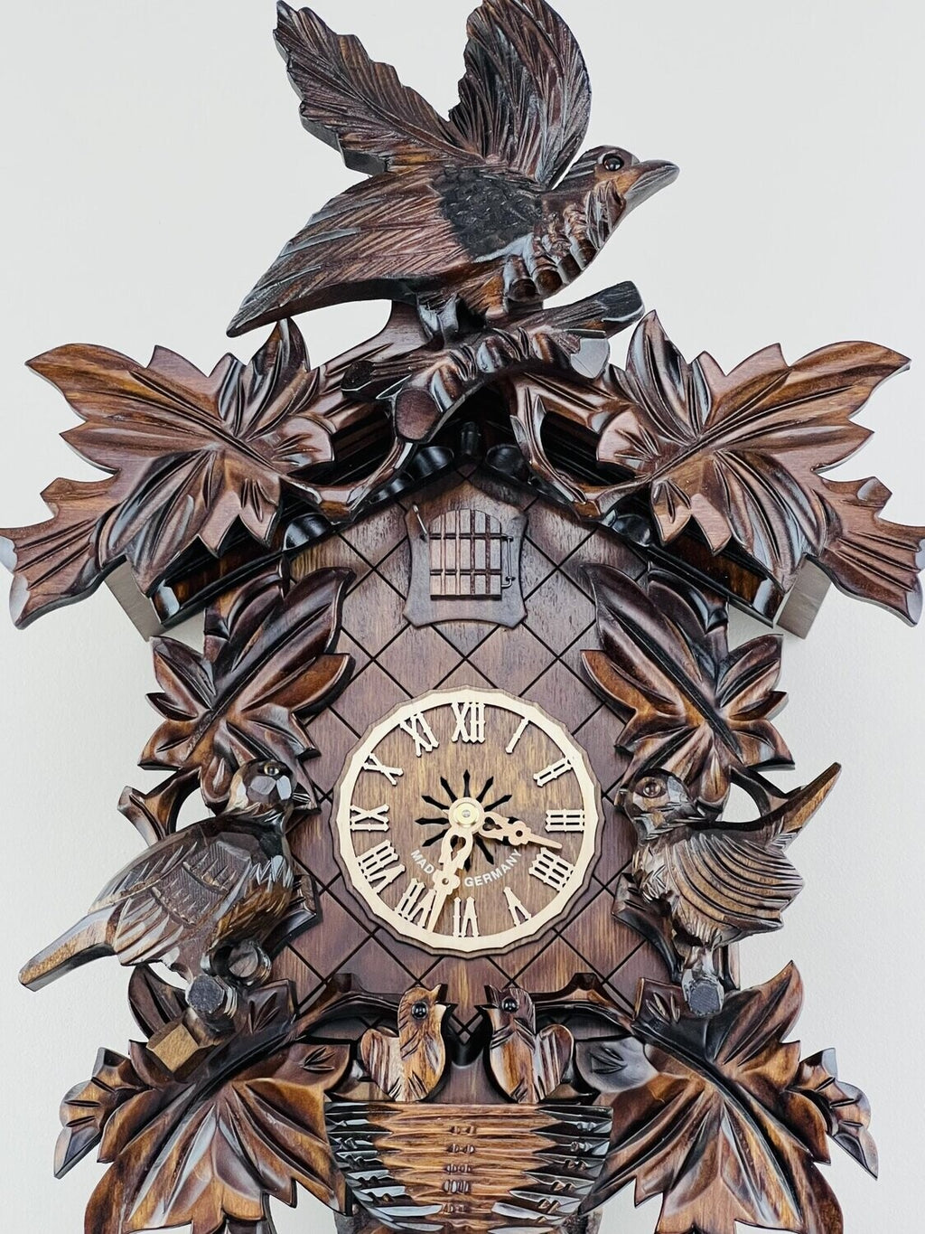 Eight Day Cuckoo Clock with Hand-carved Leaves, Birds, and Bird Nest w
