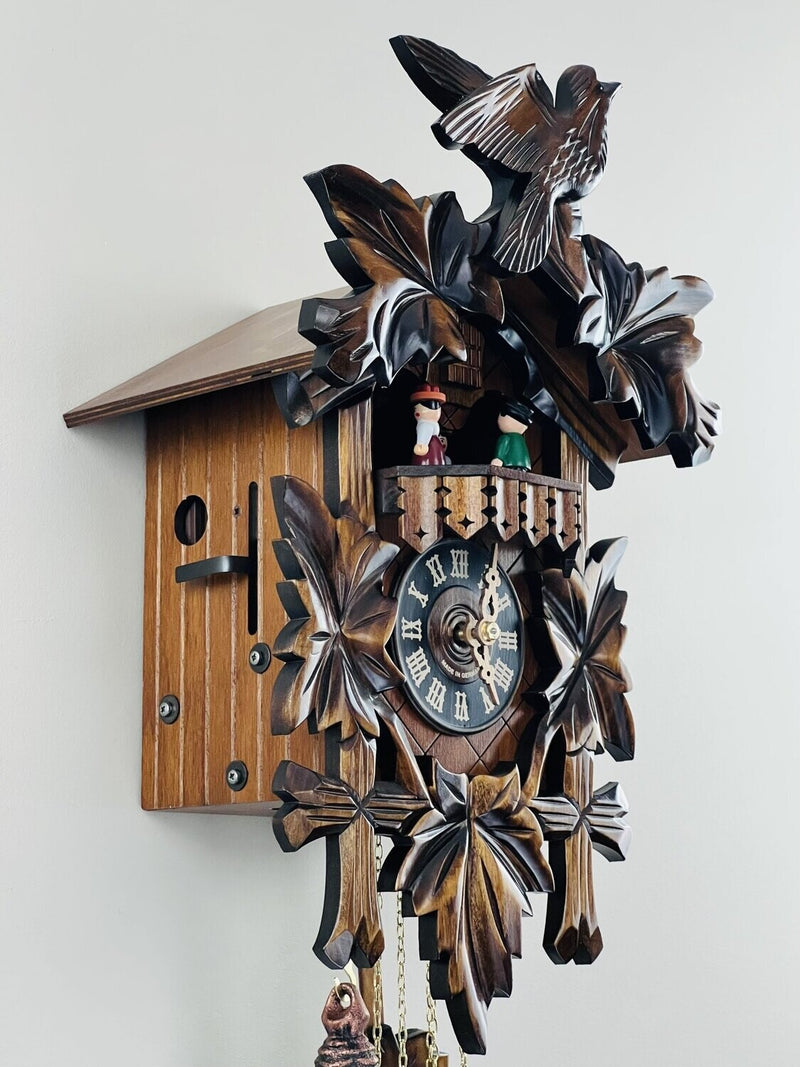 One Day Musical Cuckoo Clock with Dancers, Five Hand-carved Maple Leaves, and One Bird