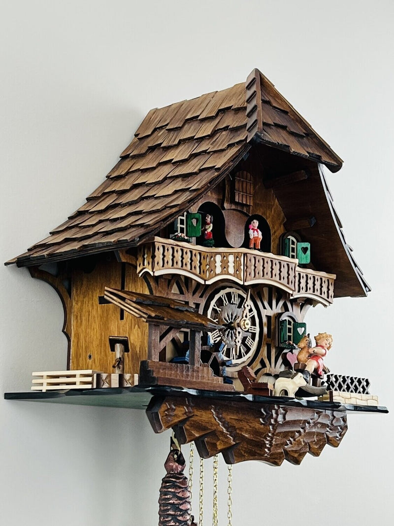 One Day Musical Black Forest Cuckoo Clock with Dancers, Waterwheel, and Girl on Rocking Horse