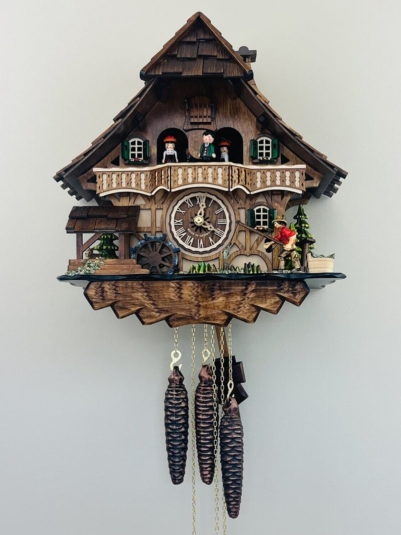 Musical Black Forest Cuckoo Clock With Dancers, Waterwheel, And Beer Drinker - 14 Inches Tall - GermanGiftOutlet.com
 - 54