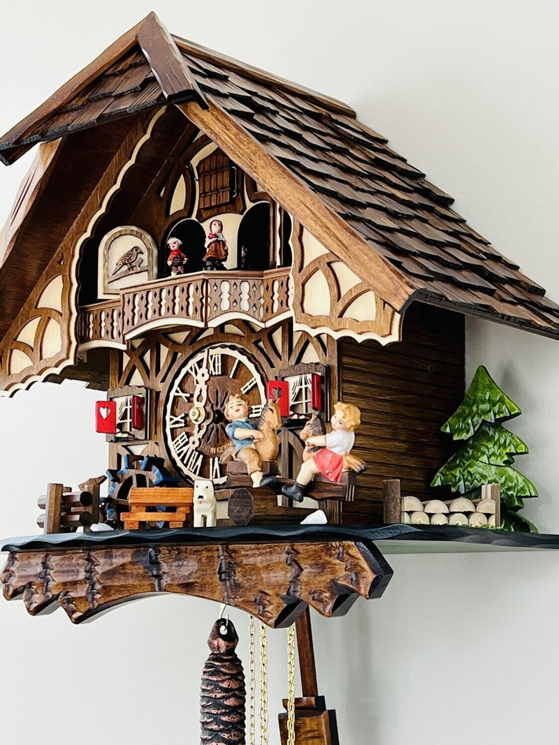 One Day Musical Cuckoo Clock Cottage with Boy and Girl on Seesaw