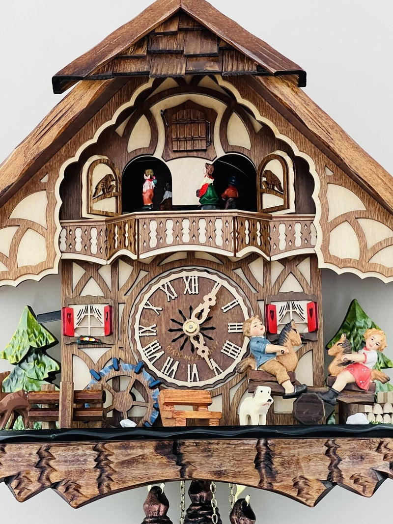 One Day Musical Cuckoo Clock Cottage with Boy and Girl on Seesaw