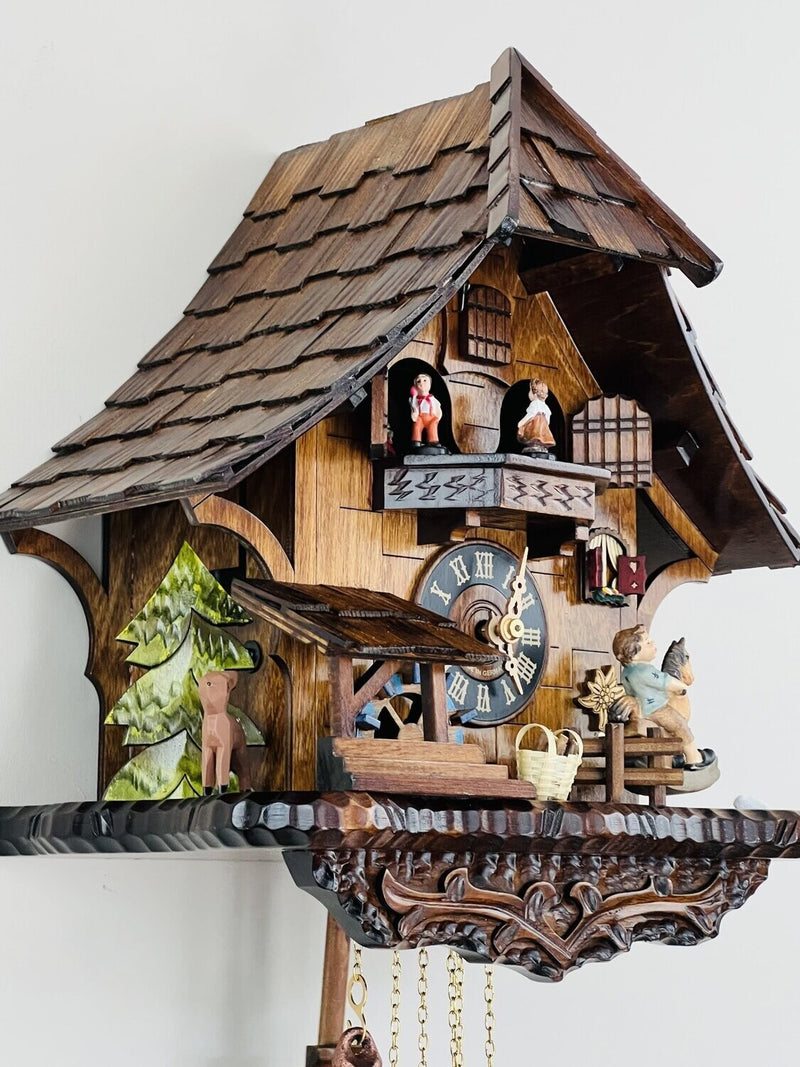 One Day Musical Cuckoo Clock Cottage with Boy on Rocking Horse, Moving Waterwheel, and Dancers