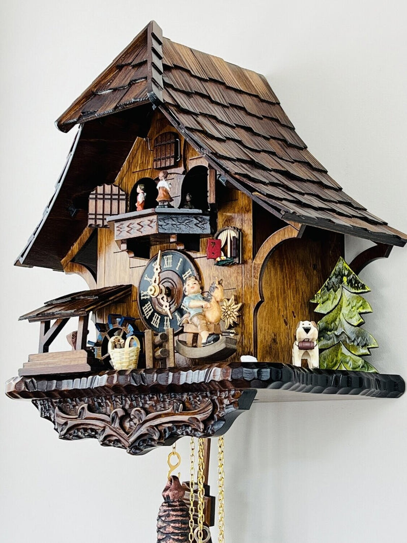 One Day Musical Cuckoo Clock Cottage with Boy on Rocking Horse, Moving Waterwheel, and Dancers