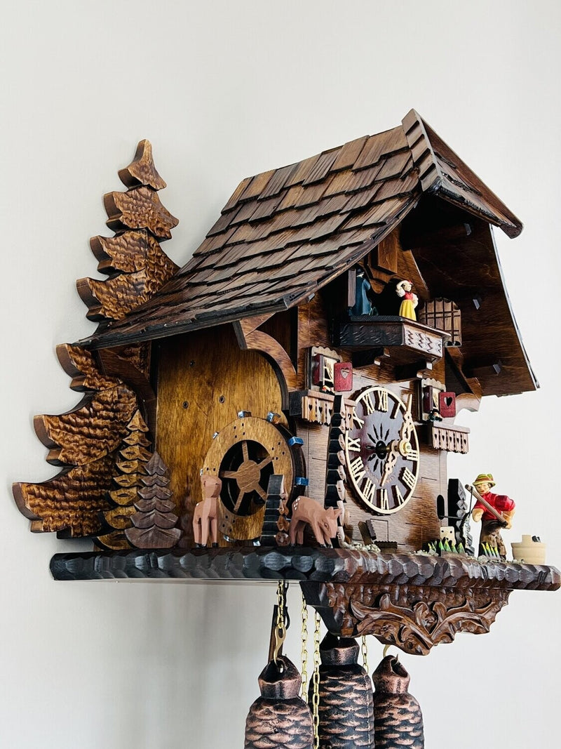 Eight Day Musical Cuckoo Clock Cottage - Fisherman Raises Pole and Moving Waterwheel