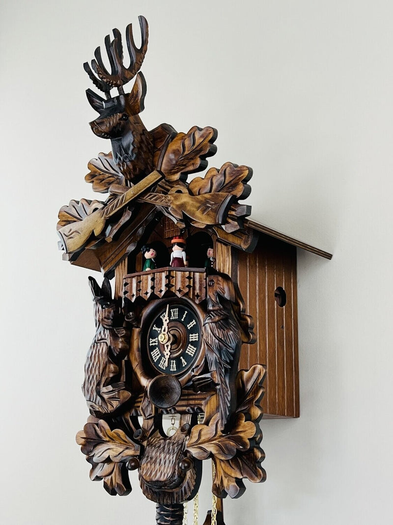 One Day Musical Hunter's Cuckoo Clock with Dancers, Hand-carved Animals, and Buck