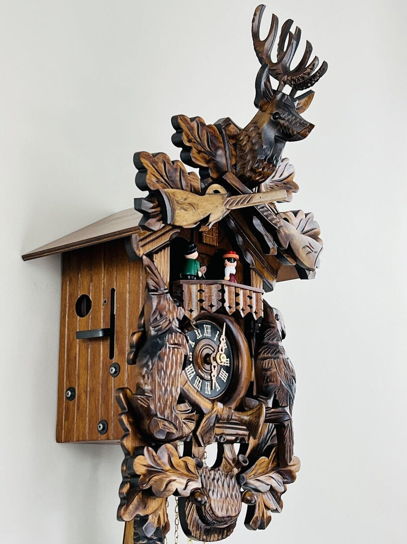 One Day Musical Hunter's Cuckoo Clock with Dancers, Hand-carved Animals, and Buck