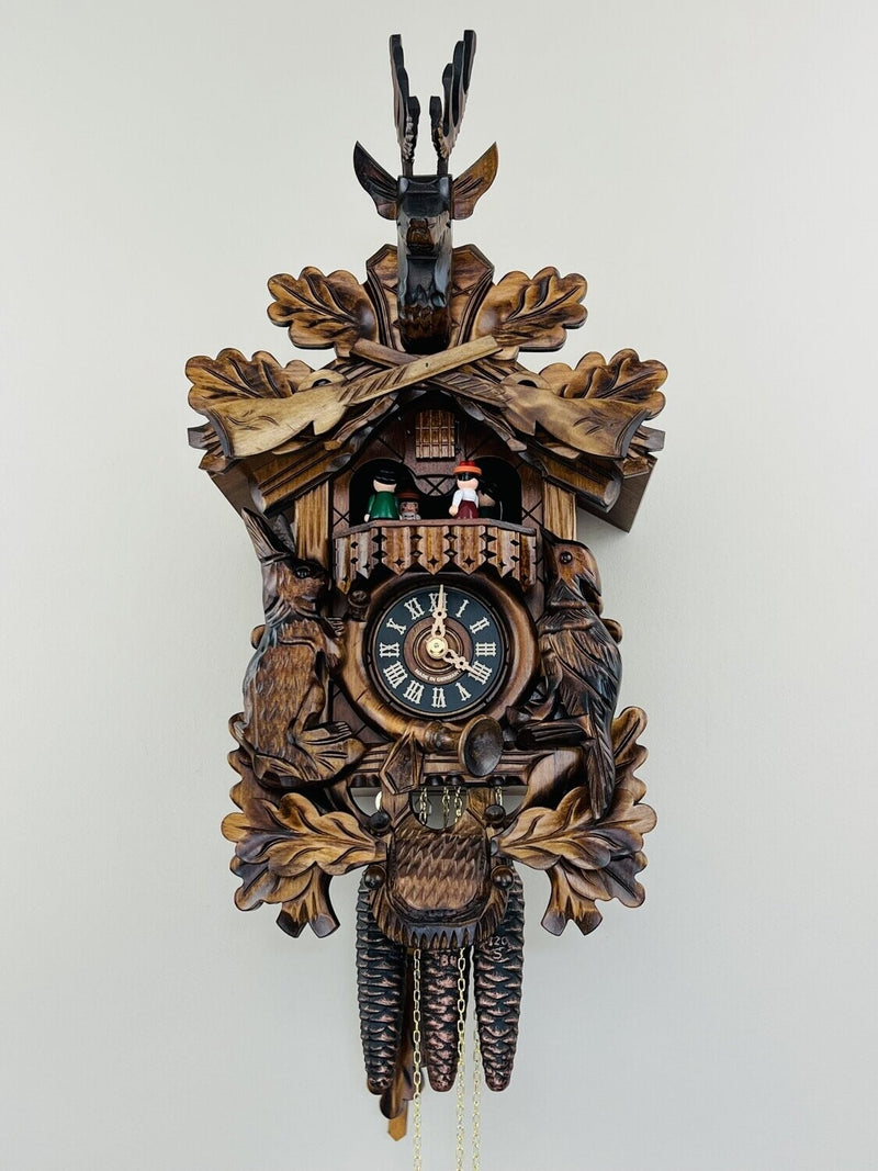 Musical Black Forest Cuckoo Clock With Dancers, Waterwheel, And Beer Drinker - 14 Inches Tall - GermanGiftOutlet.com
 - 55