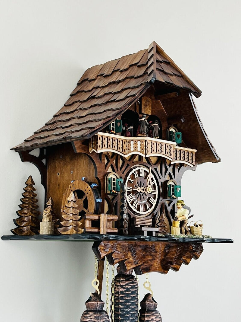 Eight Day Musical Cuckoo Clock Cottage with Woodchopper and Waterwheel