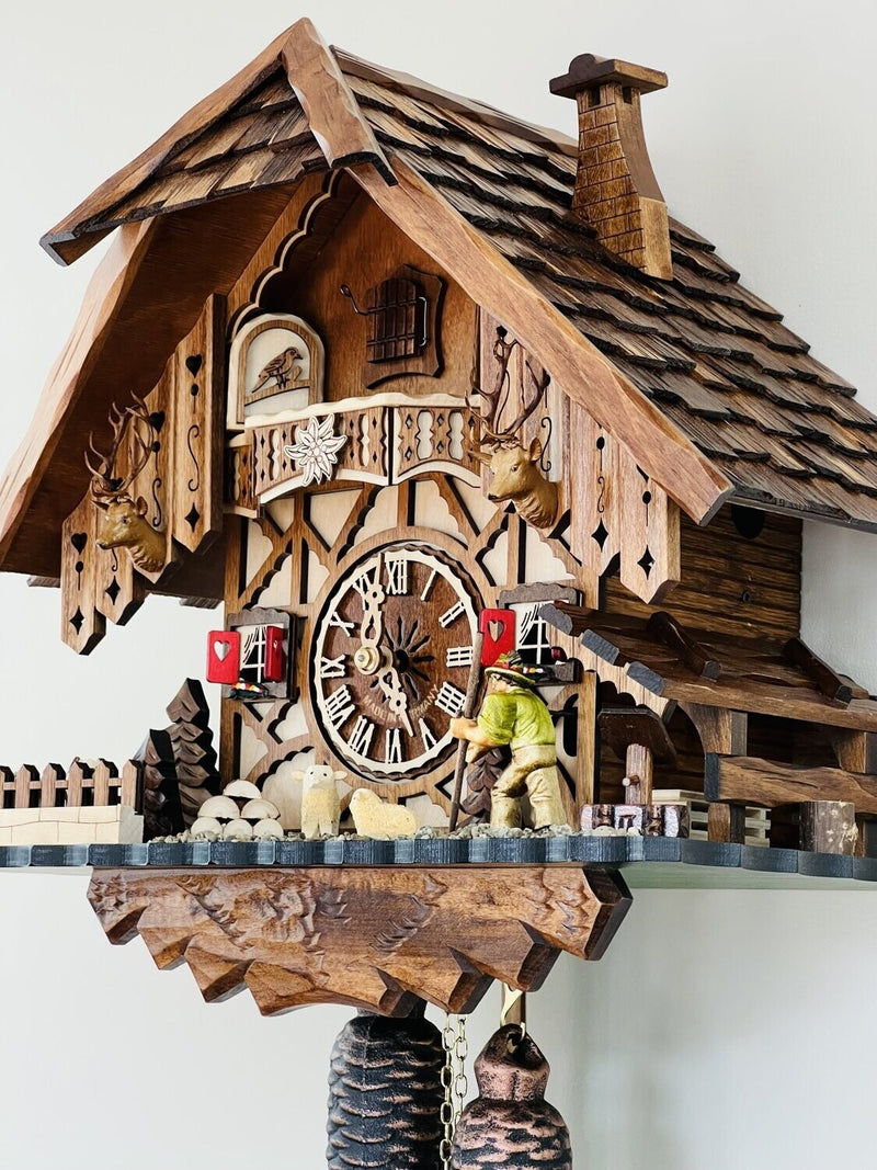 Eight Day Cuckoo Clock Chalet Volksmarcher raises staff