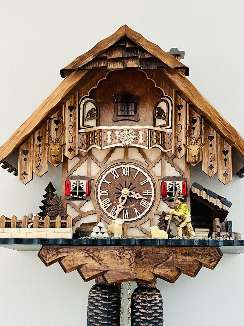 Eight Day Cuckoo Clock Chalet Volksmarcher raises staff