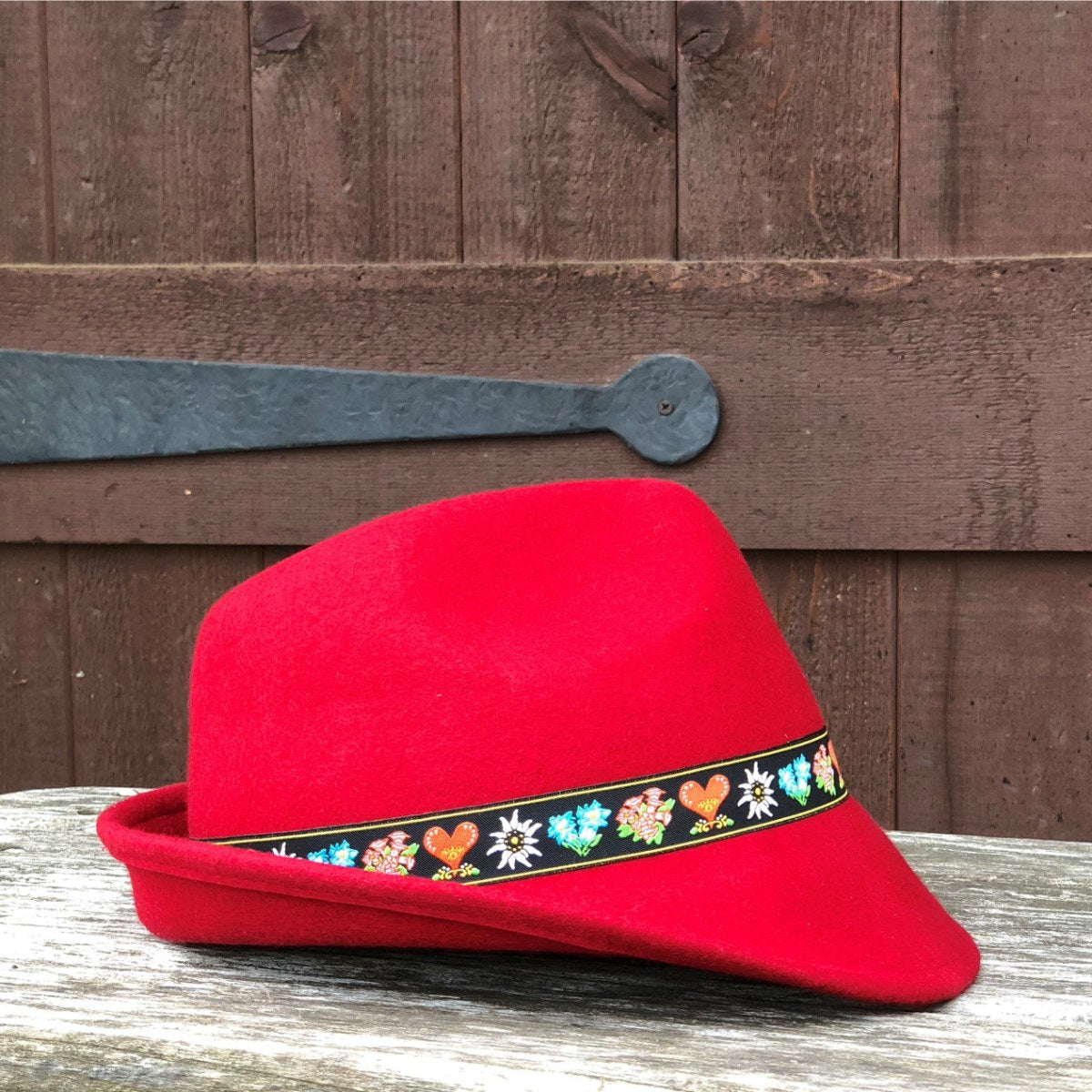 Elegant Red Tirol Hat with Embroidered Band and Deluxe Feather display picture 1