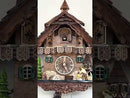 Eight Day Cuckoo Clock  - Cottage, Turret, Man Chopping Wood